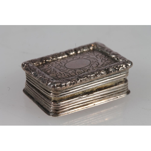 10 - William IV silver vinaigrette, of rectangular form with cast thumbpiece and engine turned decoration... 