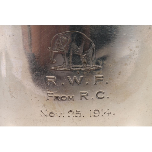 12 - Geo. V silver porringer, the two scrolled handles on a round body, on a circular foot, Mappin and We... 