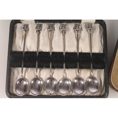 13 - Set of six Geo. V silver and enamel teaspoons, with thistle terminals leading to hammered bowls, Ber... 