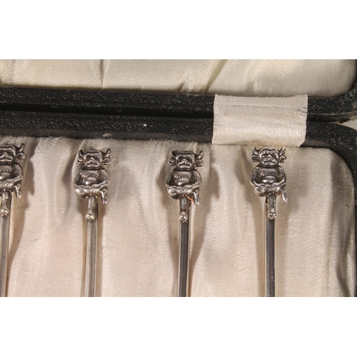 13 - Set of six Geo. V silver and enamel teaspoons, with thistle terminals leading to hammered bowls, Ber... 