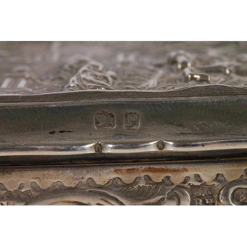 14 - Victorian silver table snuff box, the cover repousse decorated with woodland scene, the edges with s... 