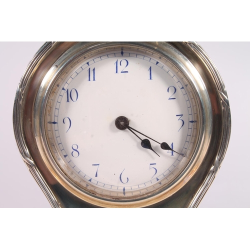 2 - Edwardian balloon shape mantel clock, with cast reeded and ribbon twist border, on four bracket feet... 
