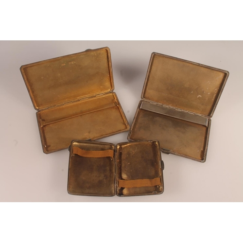 26 - Three hallmarked silver cigarette cases, various dates and makers, gross 499g.