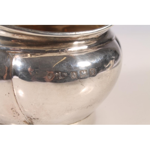 28 - Geo. V silver cream jug, of typical shape, Wilson and Sharp Birmingham 1923, together with one other... 