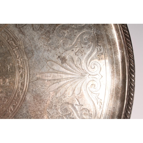 30 - Victorian silver tray of large proportions, the round tray with cast rope twist border around a spra... 