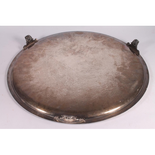 30 - Victorian silver tray of large proportions, the round tray with cast rope twist border around a spra... 