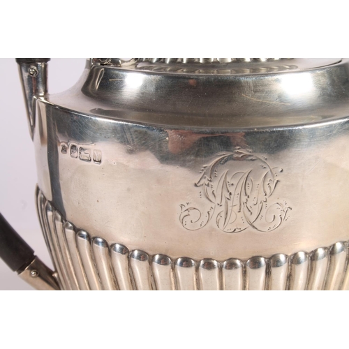 37 - Victorian three piece silver tea set, the half lobed bodies with angular handles, James Deakin and S... 