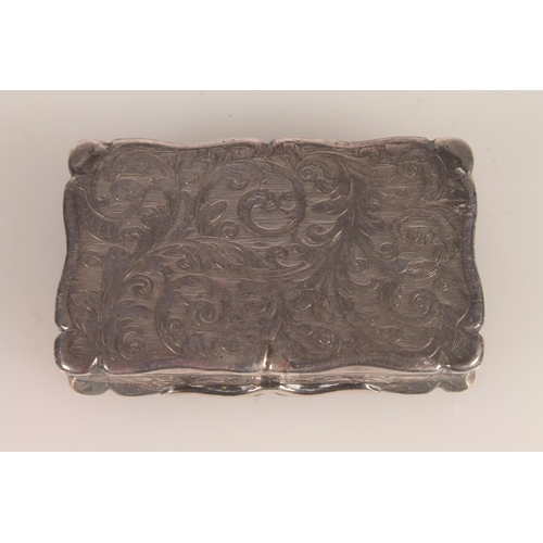 4 - Victorian silver snuff box. with shaped edges and scrolling acanthus engraved body, opening to revea... 
