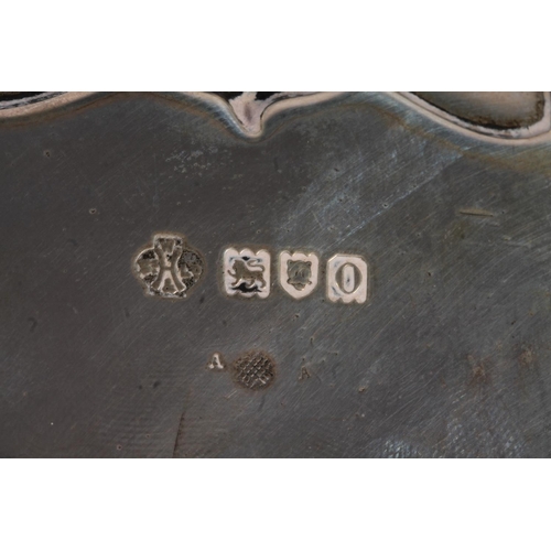 43 - Victorian silver card tray with conch shell and wavy edged border raised on three pad feet, 16cm, Wi... 