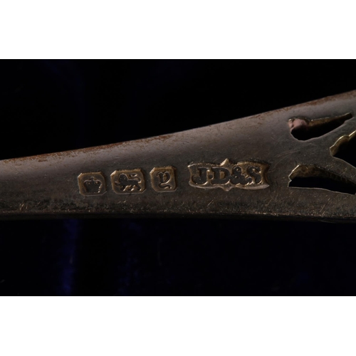 5 - Geo. IV silver tea spoon set, the eleven spoons and matching sugar tongs with gadrooned border and o... 