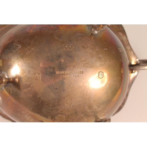 56 - Pair of Geo. V silver sauce boats, with scalloped rim and C scroll handles, Hamilton and Inches Edin... 