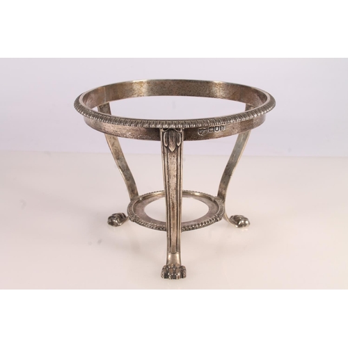 58 - Victorian silver pedestal stand, with gadrooned borer tapering to conforming undertier on three lion... 