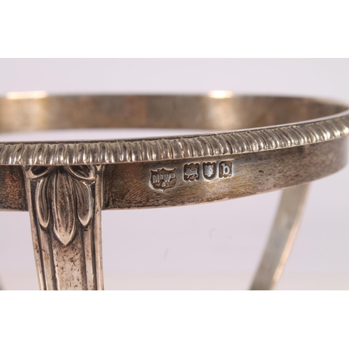 58 - Victorian silver pedestal stand, with gadrooned borer tapering to conforming undertier on three lion... 