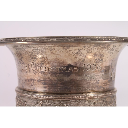 60 - Turkish silver vase, early 20th century, the cast flared rim tapering to a foliate central belt, rai... 