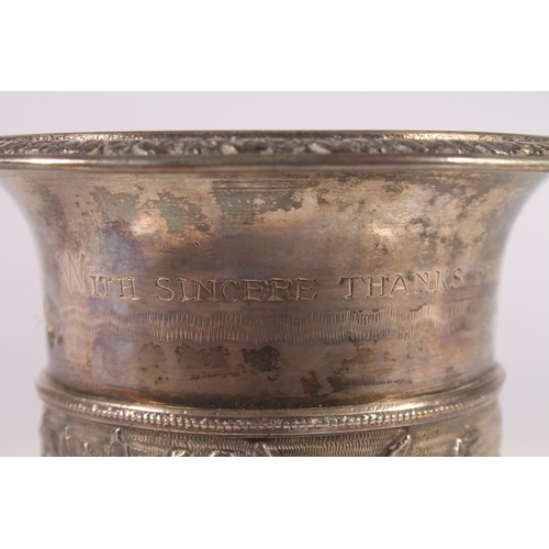 60 - Turkish silver vase, early 20th century, the cast flared rim tapering to a foliate central belt, rai... 