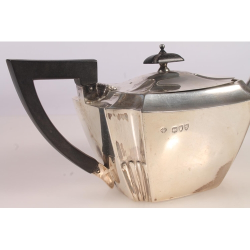 9 - Victorian silver three piece bachelors tea set, the teapot with ebonised angular handle and shaped t... 
