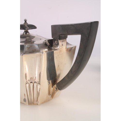 9 - Victorian silver three piece bachelors tea set, the teapot with ebonised angular handle and shaped t... 