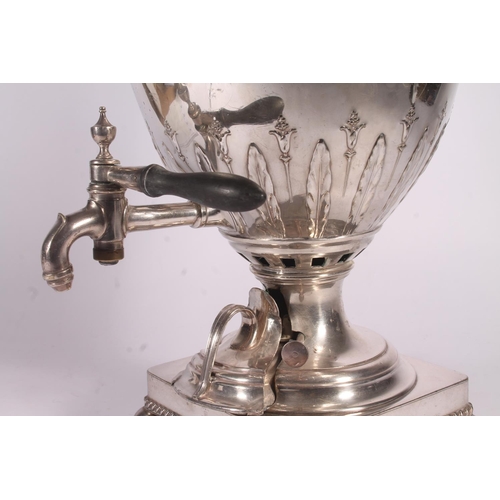 24 - Elkington and Co. silver plated samovar, late 19th century, the urn finial over a domed and embossed... 