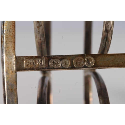 38 - Victorian silver six division toast rack raised on bracket feet with conch shell decoration, Robert ... 