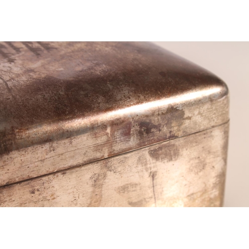 42 - Silver cigarette box of plain rectangular form with wood lined interior, inscribed 'Presented to Lt ... 