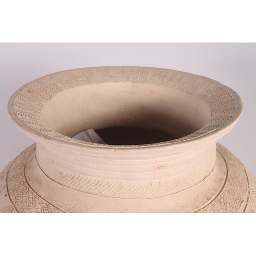 310 - Ladi Kwali (Nigerian 1925-1984); An Abuja biscuit ware studio pottery grain pot, of large proportion... 