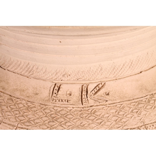 310 - Ladi Kwali (Nigerian 1925-1984); An Abuja biscuit ware studio pottery grain pot, of large proportion... 