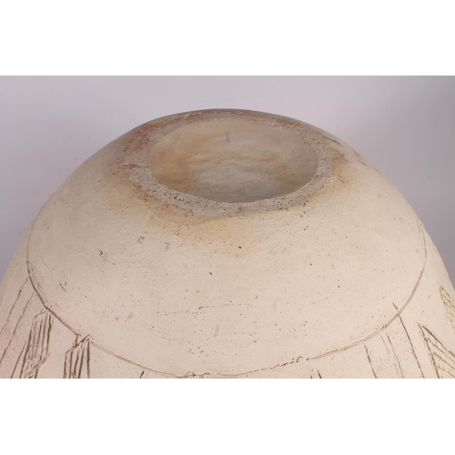 310 - Ladi Kwali (Nigerian 1925-1984); An Abuja biscuit ware studio pottery grain pot, of large proportion... 