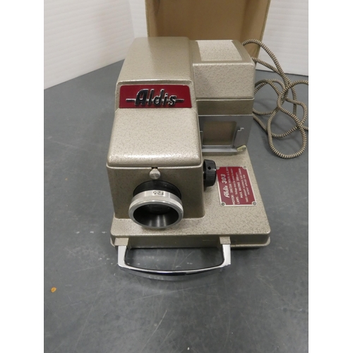 29 - Aldis 303 projector and screen.