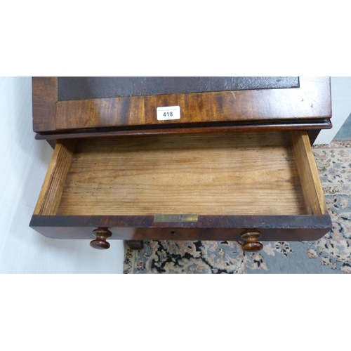 418 - Victorian mahogany writing desk with ratchet pull-up top and single drawer.