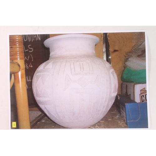 310 - Ladi Kwali (Nigerian 1925-1984); An Abuja biscuit ware studio pottery grain pot, of large proportion... 