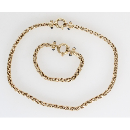 167 - 9ct yellow gold sapphire set necklace and matching bracelet, the fancy link chains set cabochon ston... 