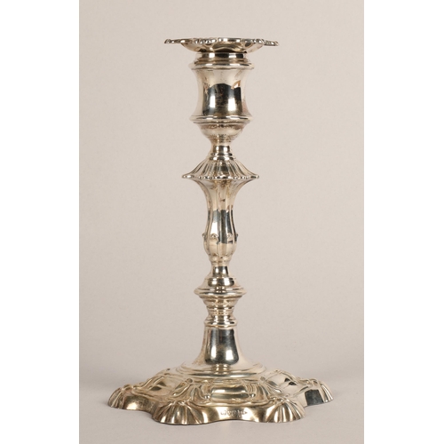 98 - Pair of weighted silver candlesticks, assay marked Chester 1906, maker Walker & Hall22.5cm high... 
