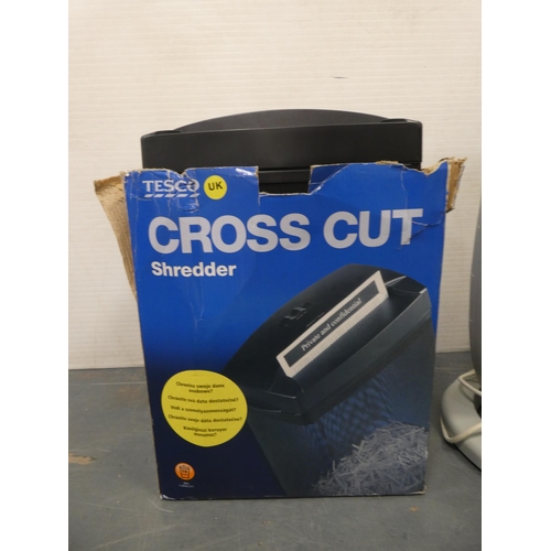 45 - Shredder, Astor heater and a suitcase.