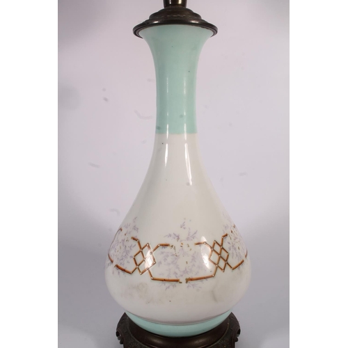 16 - Late Victorian painted glass oil lamp, 68cm high.