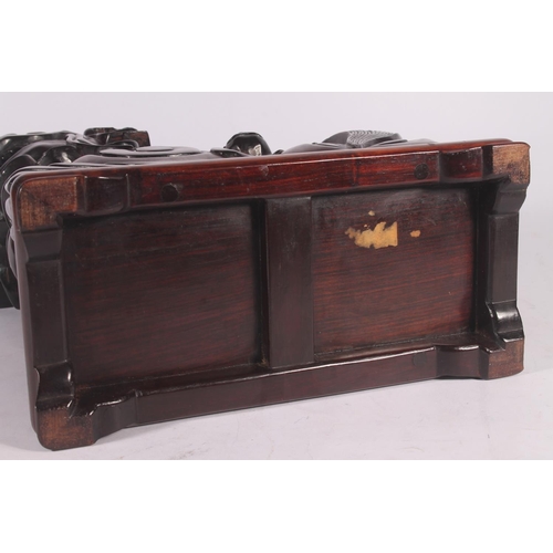 17 - Chinese carved hardwood Qilin or Foo Dog figure, 36cm high.