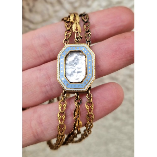 57 - Ladies three strand yellow metal bracelet with enamelled mourning clasp, 10.2g