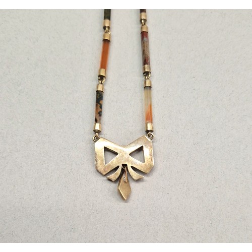 56 - Ladies agate necklace mounted in unmarked yellow metal, 39cm long