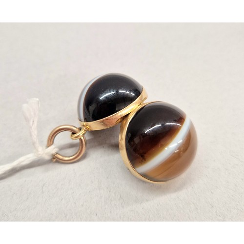 78 - Victorian agate spherical locket pendant with yellow metal mounts