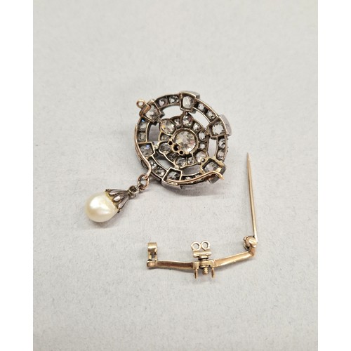 61 - Impressive diamond encrusted brooch, central 1.5 carat stone surrounded by six 0.20 stone interspers... 
