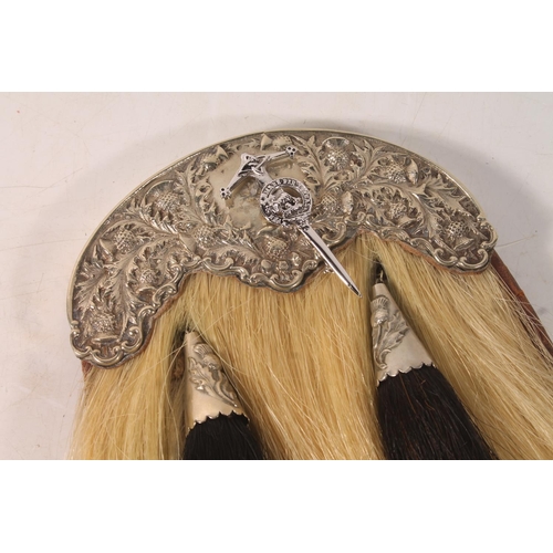 2 - Sporran and a similar belt.