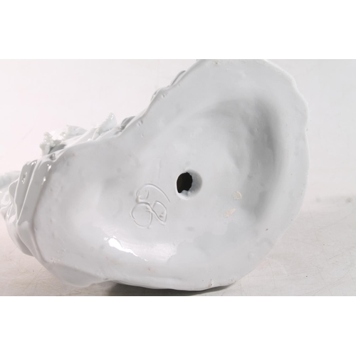 20 - Modern Chinese blanc-de-chine figurine, 31cm high.