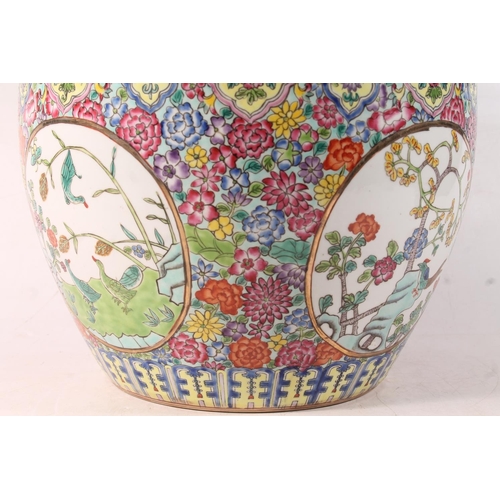 23 - Modern Chinese porcelain fish bowl, 27cm high.