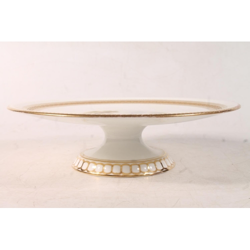 27 - Victorian porcelain cakestand with central painted landscape decoration.