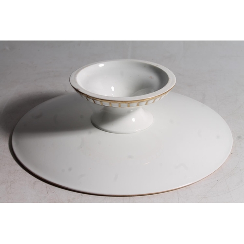 27 - Victorian porcelain cakestand with central painted landscape decoration.