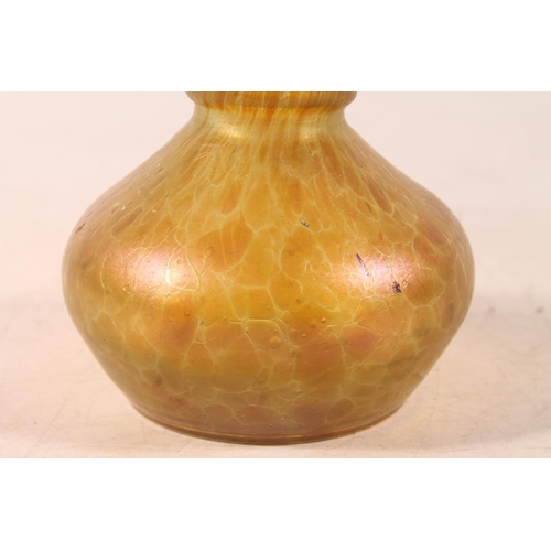 28 - Late 19th century iridescent glass vase, 12cm high.