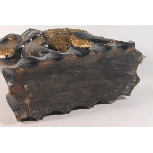 33 - Ebonised and gilt model of an Indian elephant, 44cm high.