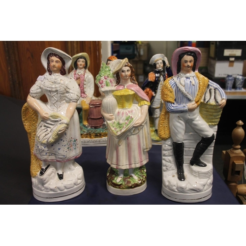 35 - Five 19th century Staffordshire figures, largest 33cm high.