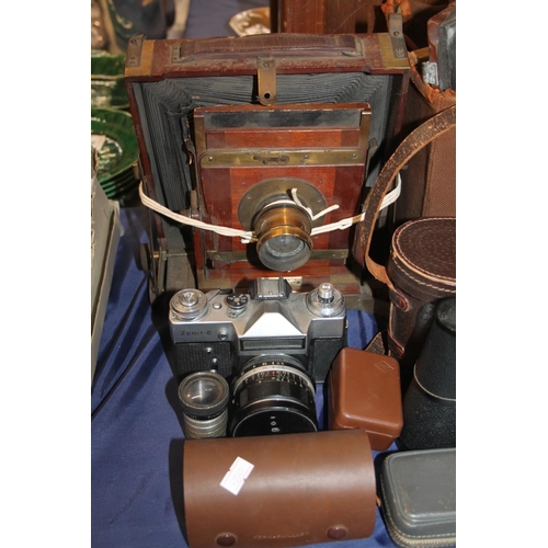39 - Folding plate camera and accessories, a Soligor vintage camera, binoculars, etc.