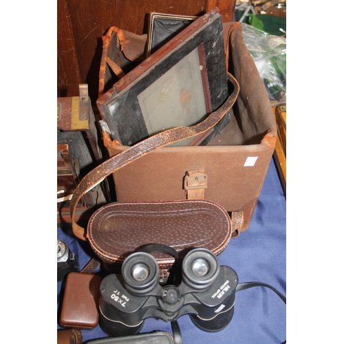 39 - Folding plate camera and accessories, a Soligor vintage camera, binoculars, etc.