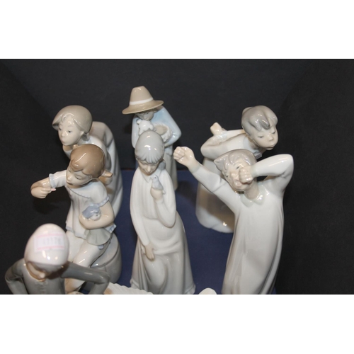 47 - Nao, and other, Spanish porcelain figurines.